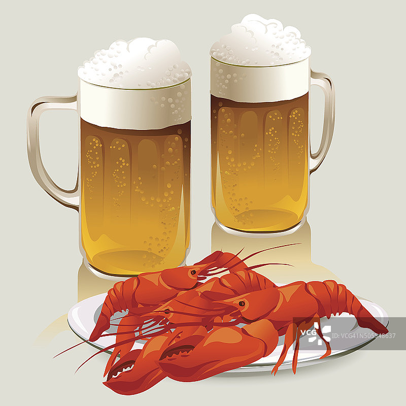 啤酒杯和一盘小龙虾图片素材