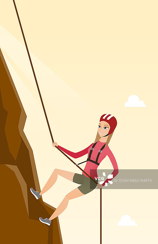 一个白人女人用绳子爬山图片素材