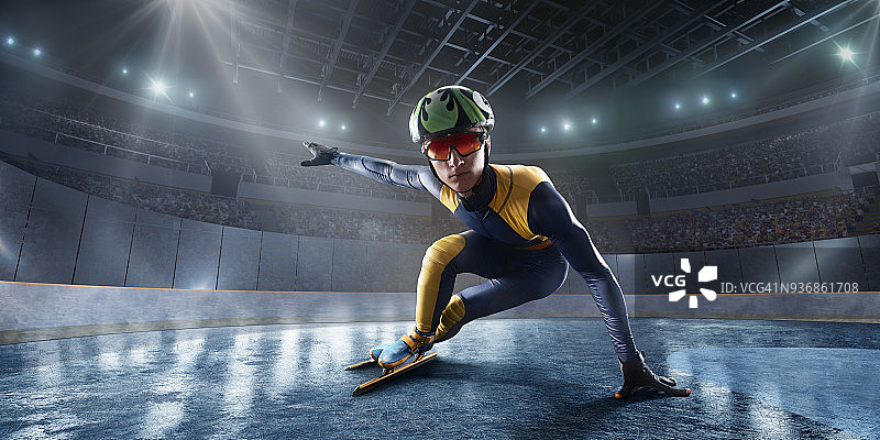 男子短道运动员滑在专业冰场图片素材