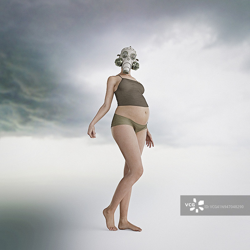 空气污染概念:孕妇戴防毒面具图片素材