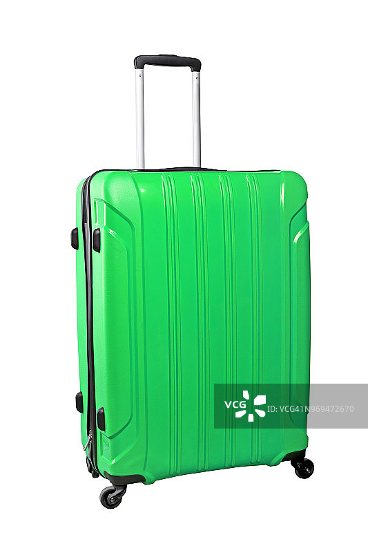 白色背景上孤立的绿色旅行袋。图片素材