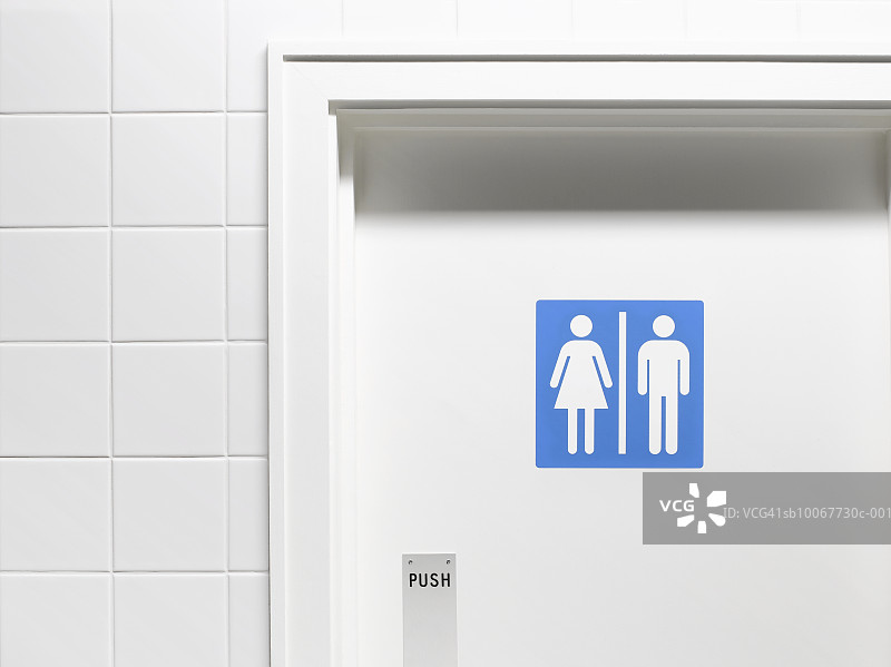 厕所门上男女标志，特写图片素材
