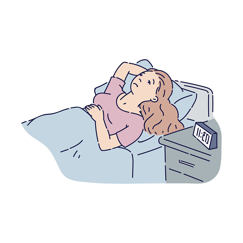一个疲倦的年轻女人躺在床上想睡觉,但是图片