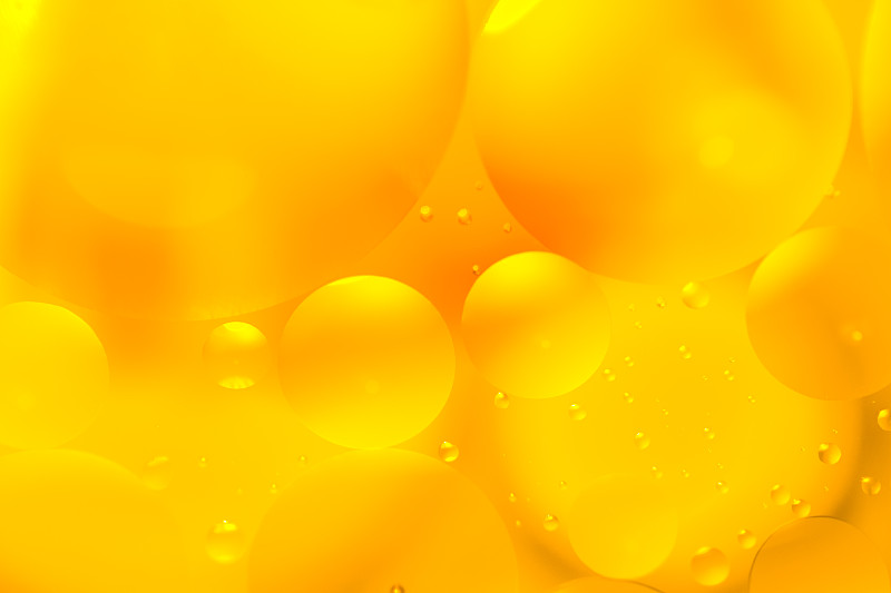 油和水黄色的气泡和水滴图片素材