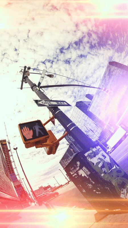 低角度的人行横道信号与太阳耀斑，纽约市，纽约，美国图片下载