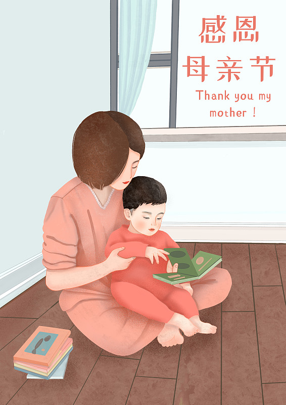 感恩母亲节妈妈抱小孩看书图片素材