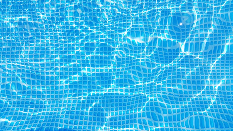 全帧拍摄的涟漪水在游泳池图片素材
