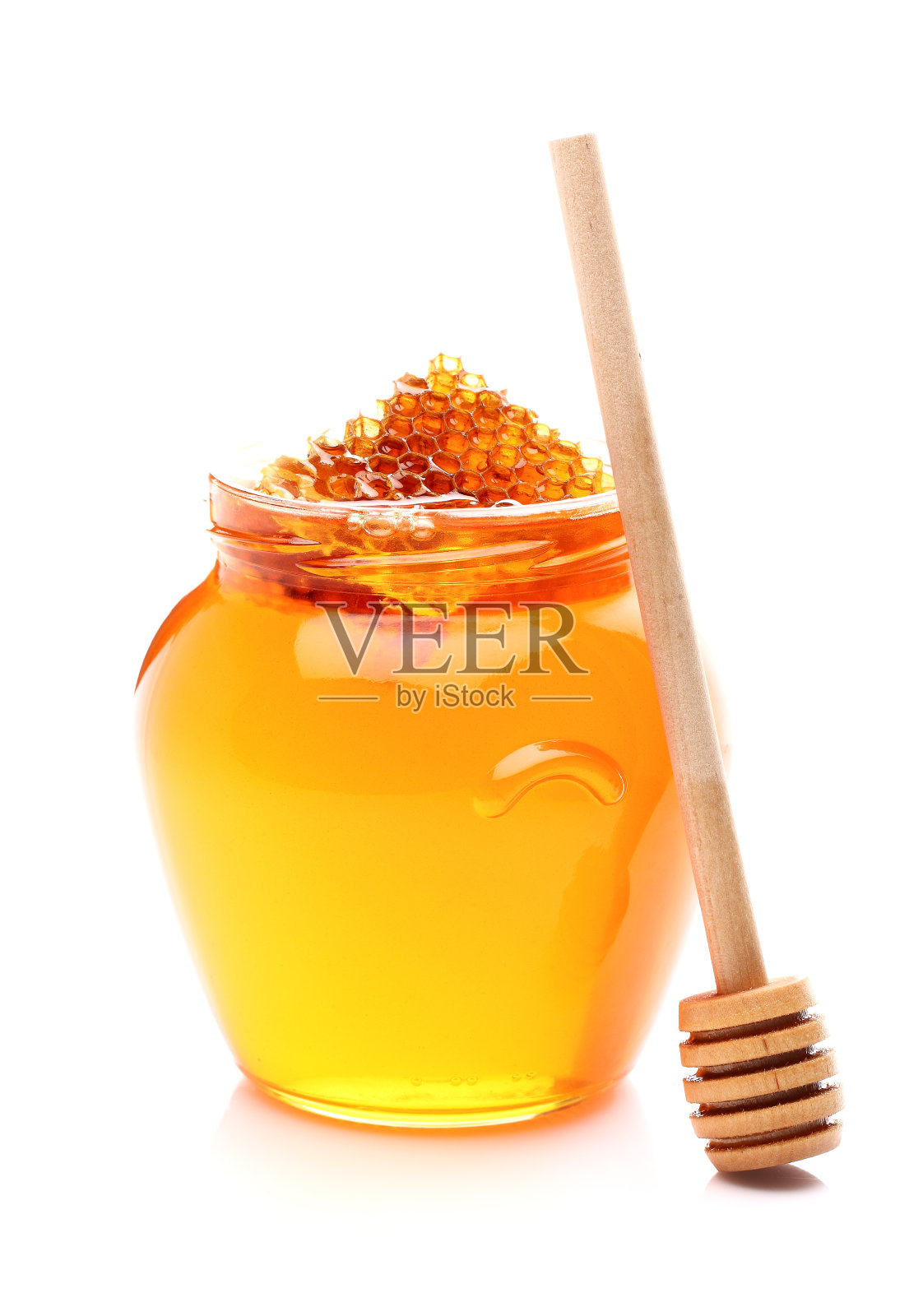 新鲜蜂蜜与木勺照片摄影图片
