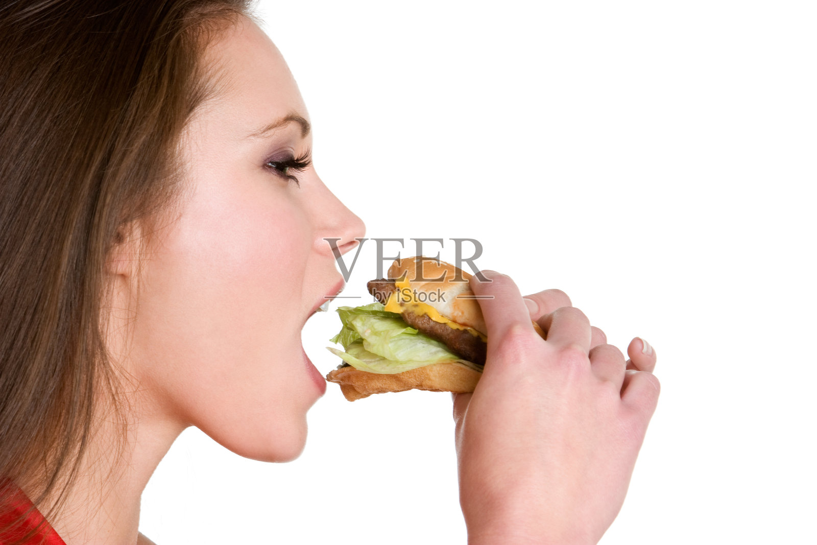 在白色背景下吃汉堡包的女人照片摄影图片