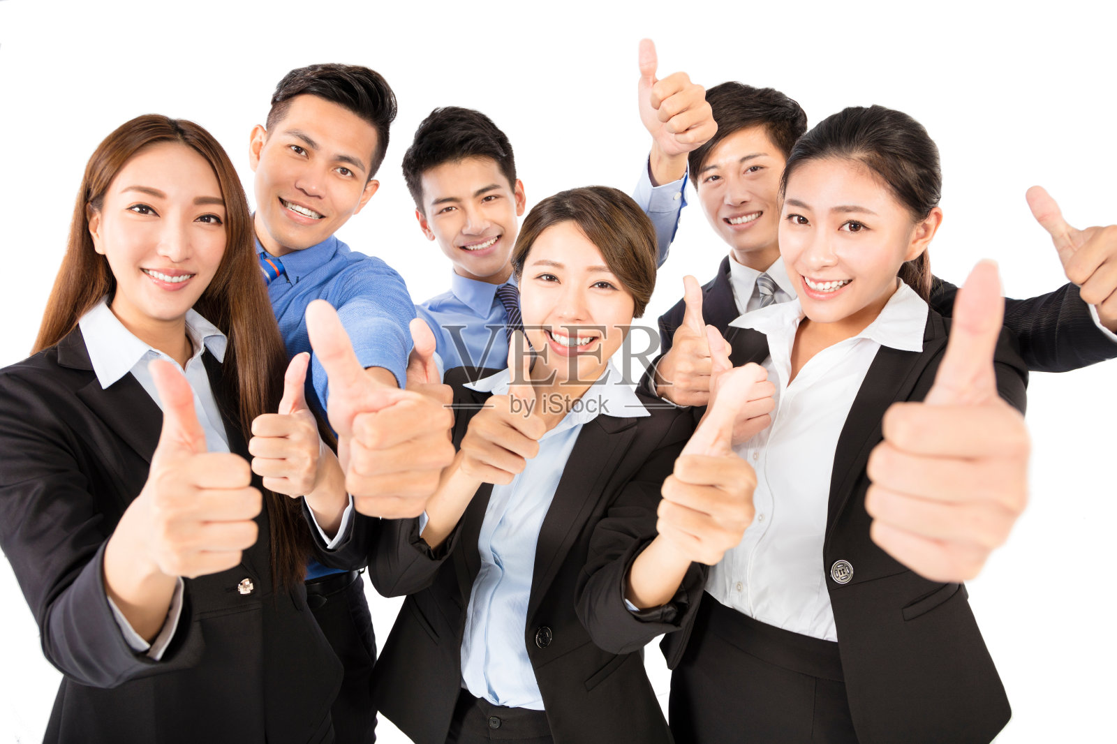 快乐的Young Business团队用大拇指向上的手势照片摄影图片