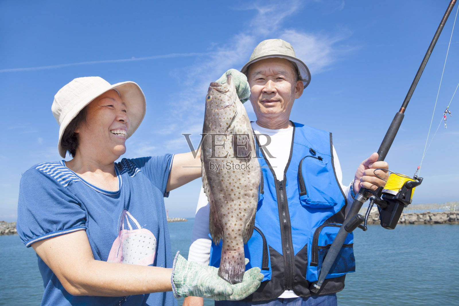 亚洲年长钓鱼照片摄影图片