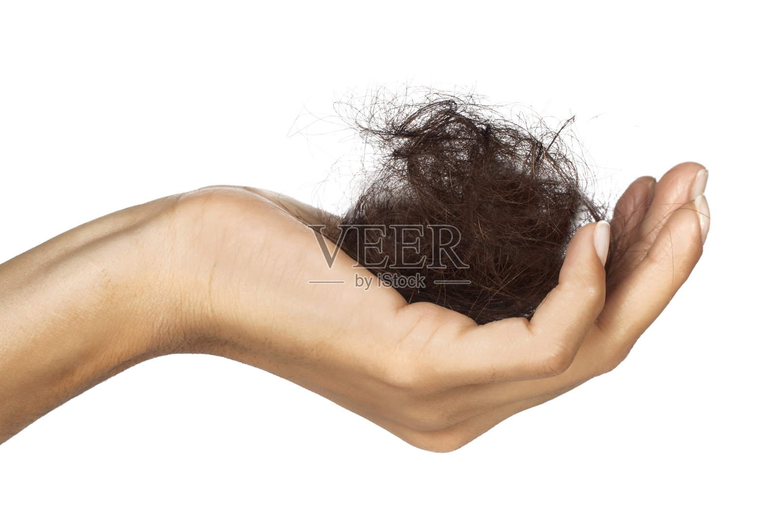 手里握着一团头发的女人照片摄影图片