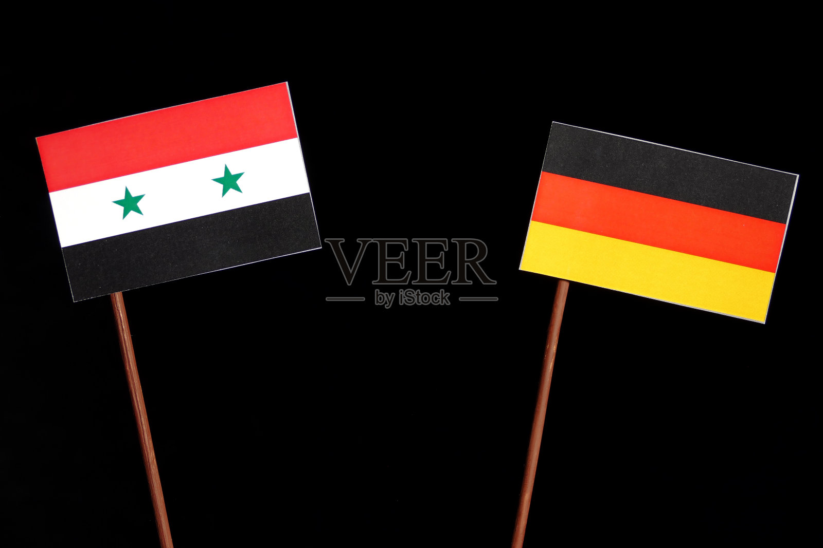 叙利亚国旗和德国国旗孤立在黑色背景上照片摄影图片