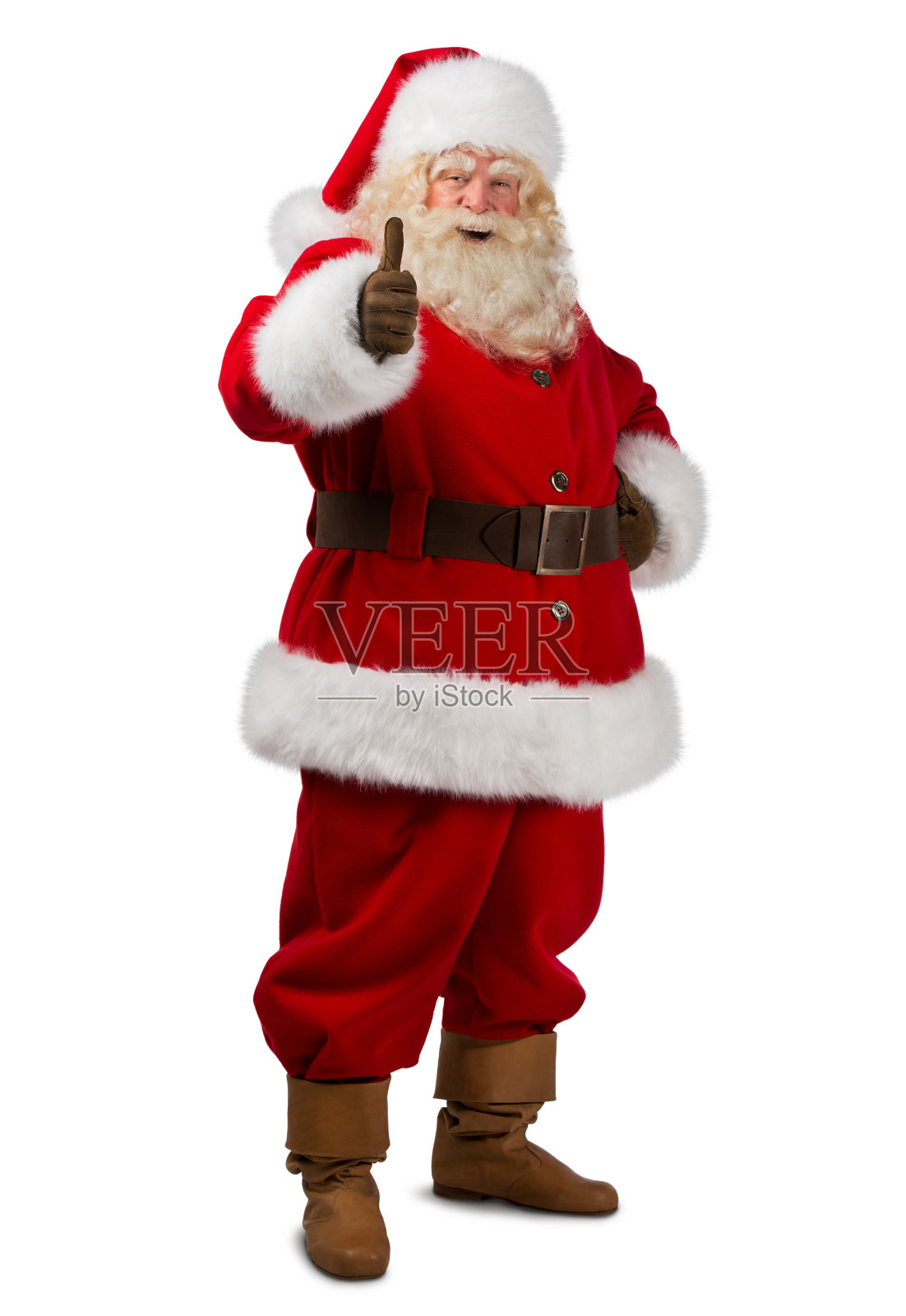圣诞老人孤立地站在白色背景上，竖起大拇指照片摄影图片