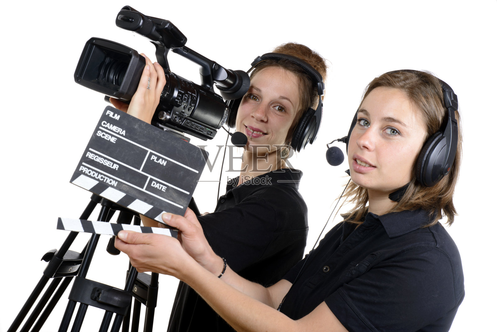 两个拿着摄像机的年轻女人照片摄影图片