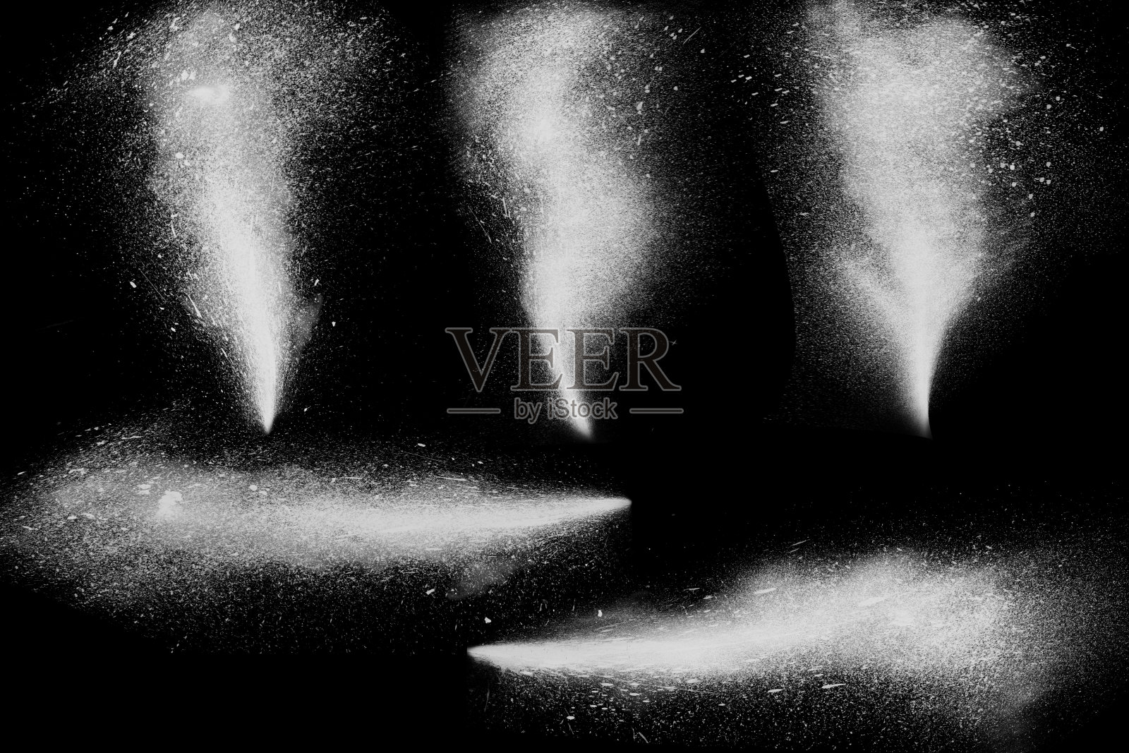 白色粉末涂料的冻结运动爆炸流孤立的黑色背景照片摄影图片
