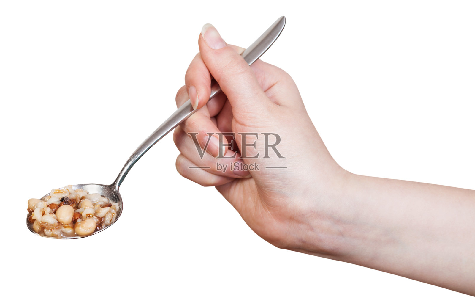 手握勺子用豆汤隔离照片摄影图片