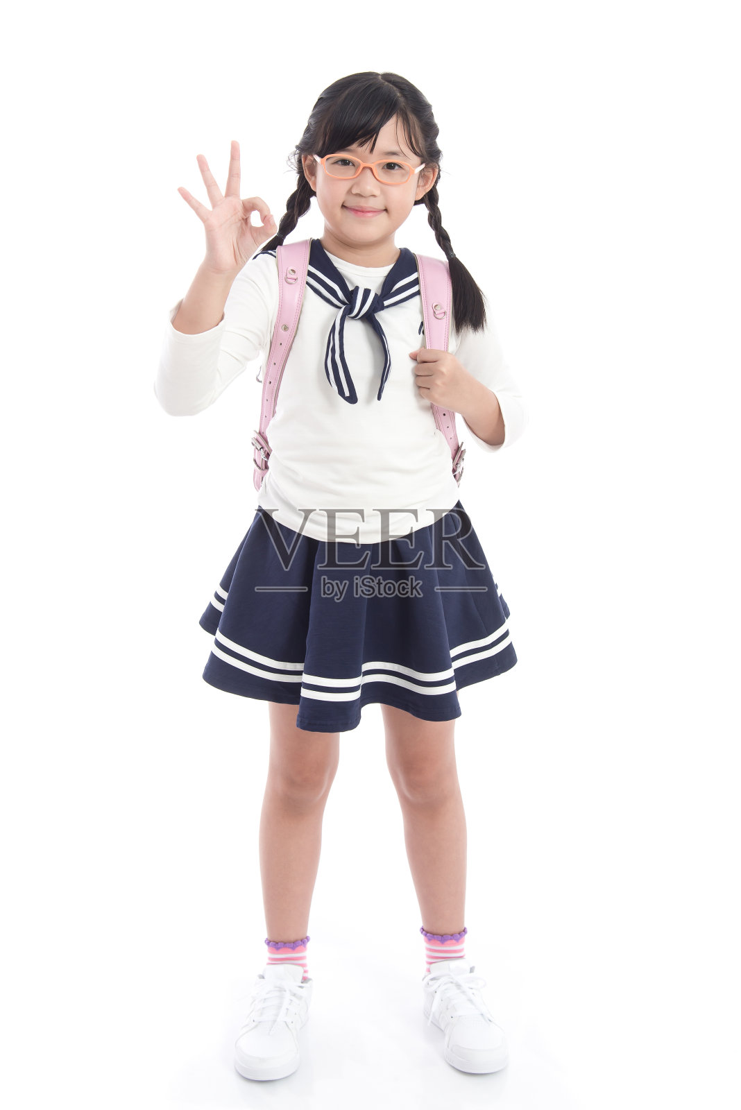 亚洲儿童校服和粉红色的书包照片摄影图片
