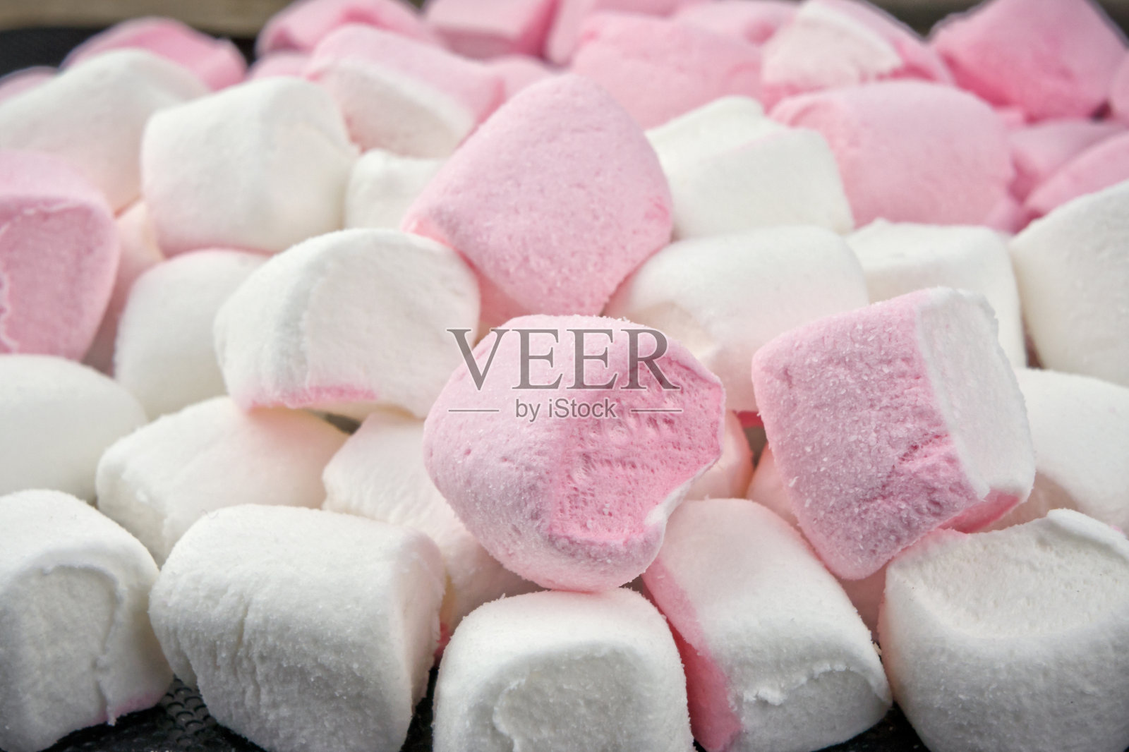 白色和粉红色的棉花糖背景照片摄影图片