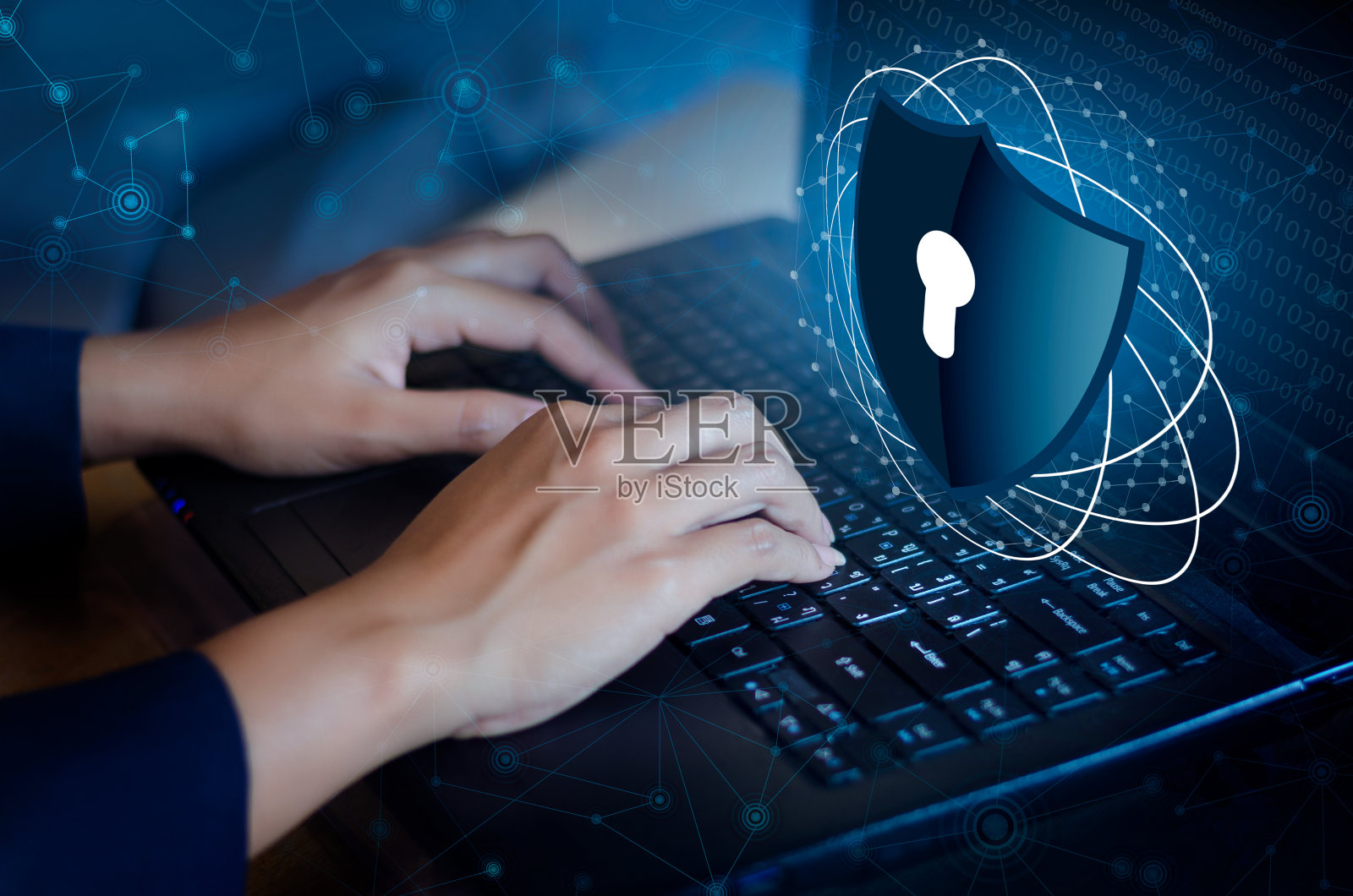 按键盘上的回车键电脑盾网锁安全系统抽象技术世界数字链接网络安全高科技深蓝色背景，输入密码登录。锁键盘的手指照片摄影图片