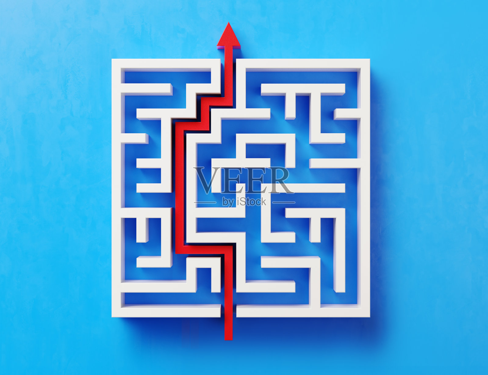 红色路径穿过白色迷宫在蓝色背景照片摄影图片