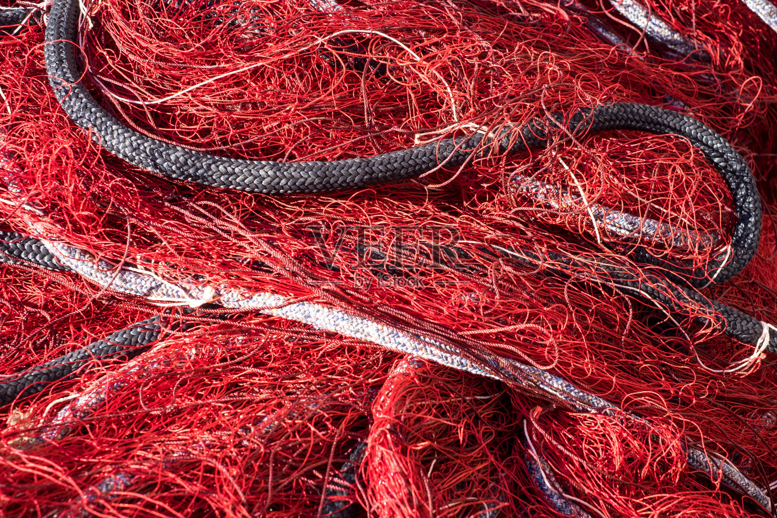 带绳的红色渔网照片摄影图片