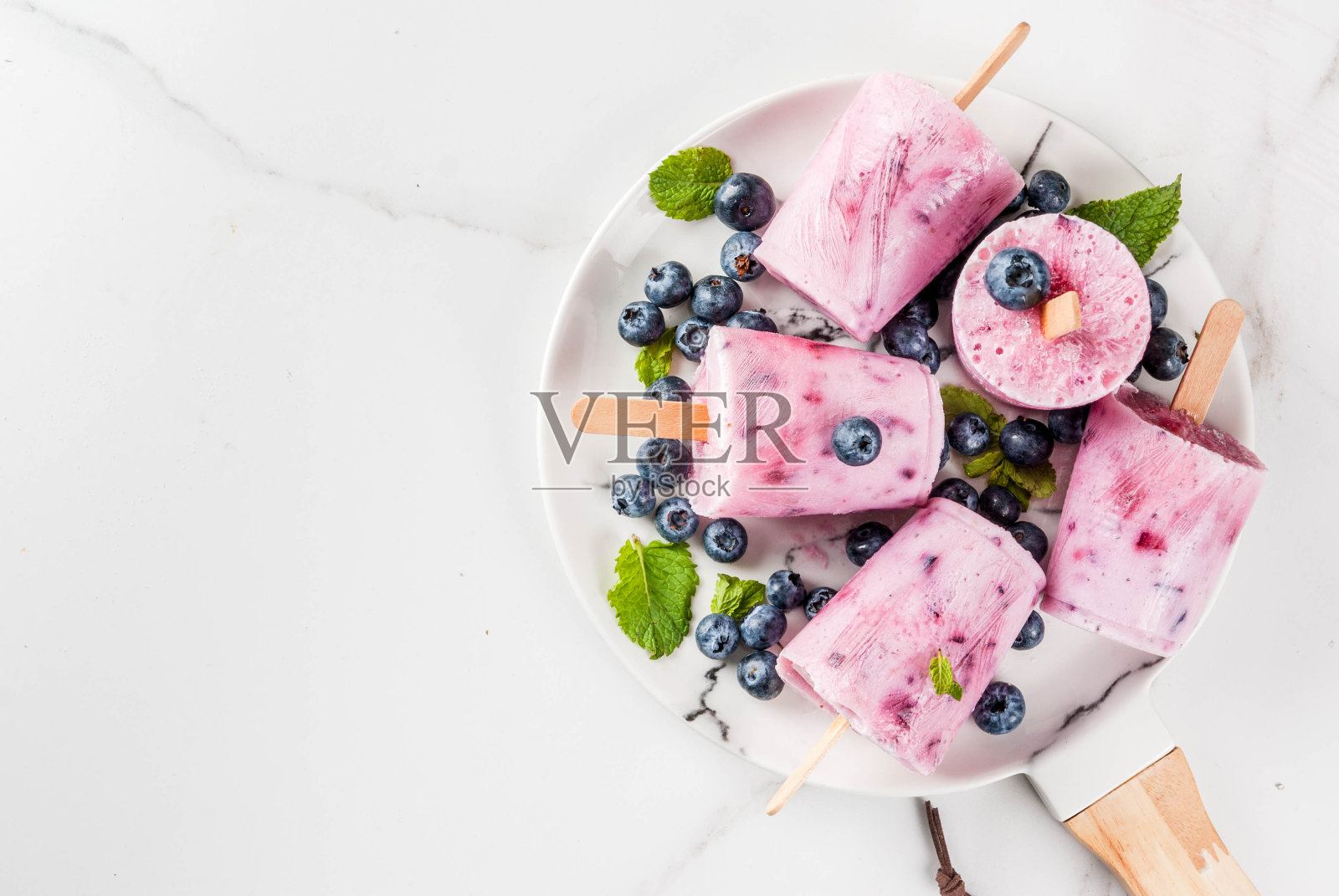 蓝莓冰淇淋冰棒照片摄影图片