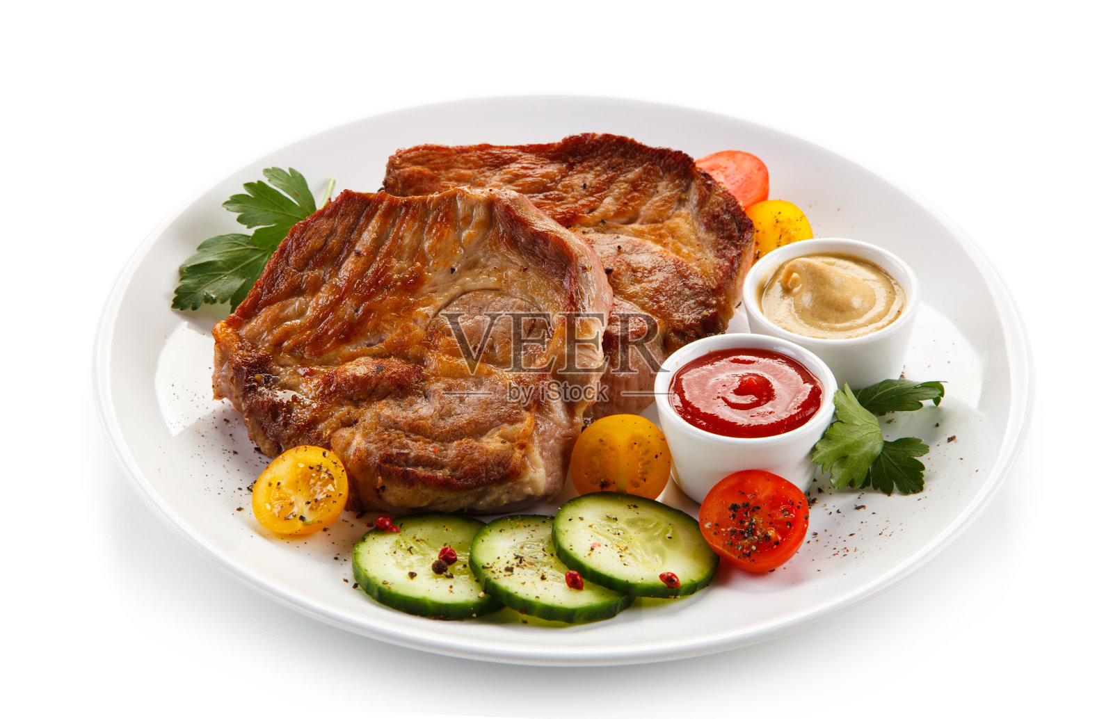烤猪肉和蔬菜照片摄影图片
