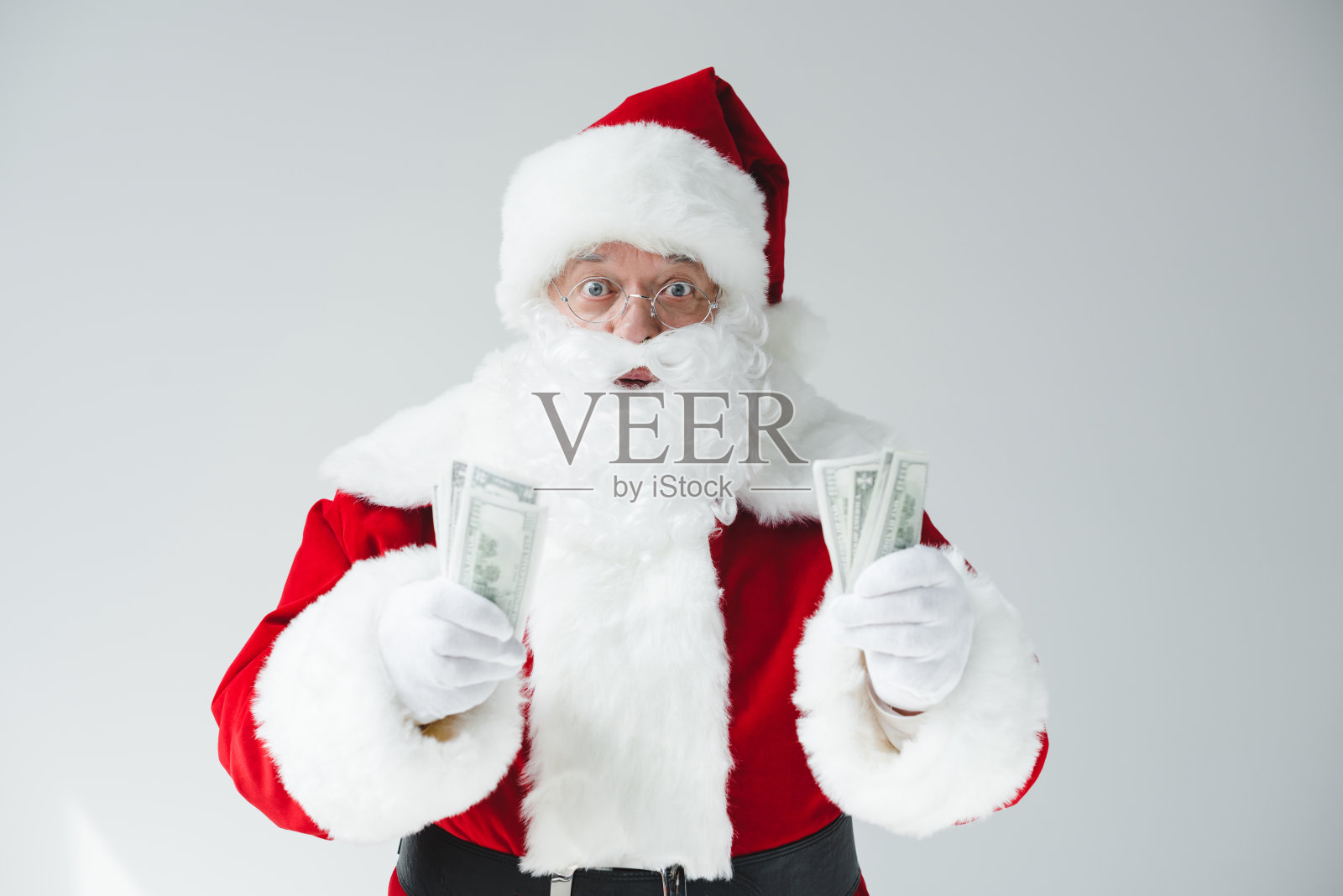 圣诞老人和美元钞票照片摄影图片