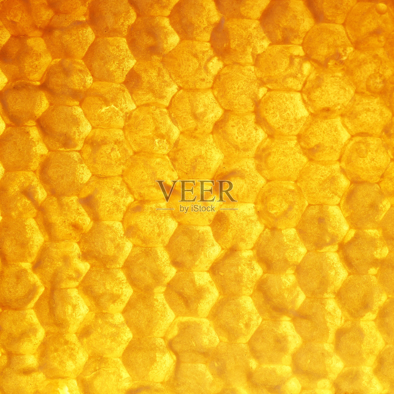 方形的美味背景金色的蜂窝与流动的粘稠甜明亮芬芳的蜂蜜照片摄影图片