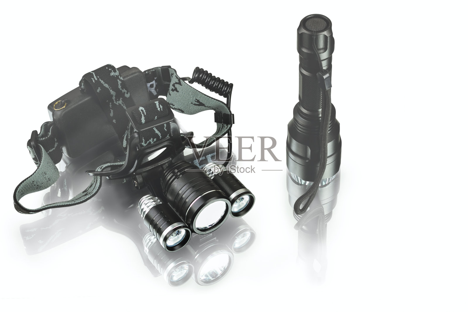 阳极氧化铝防水战术手电筒和头灯照片摄影图片