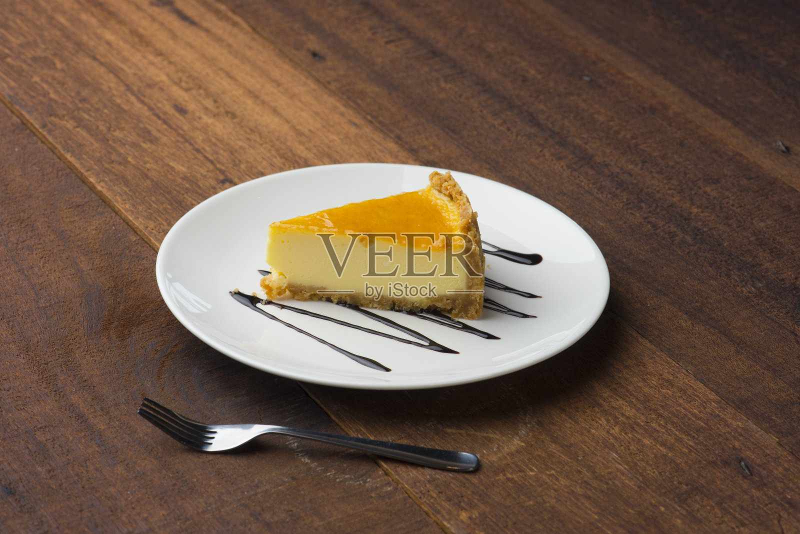 黄色蛋糕与木材背景照片摄影图片