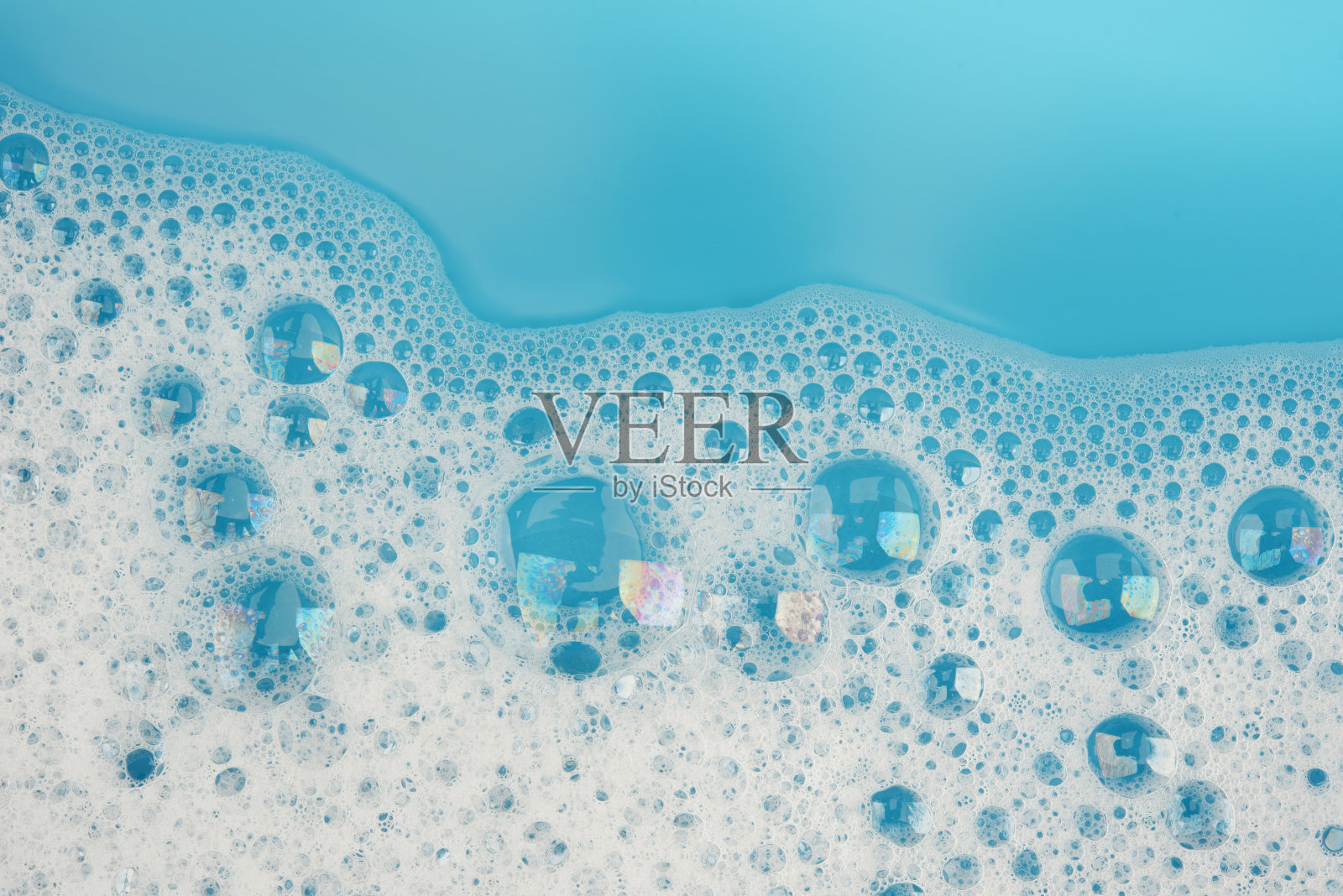 泡沫泡沫上的蓝色水面背景俯视图照片摄影图片