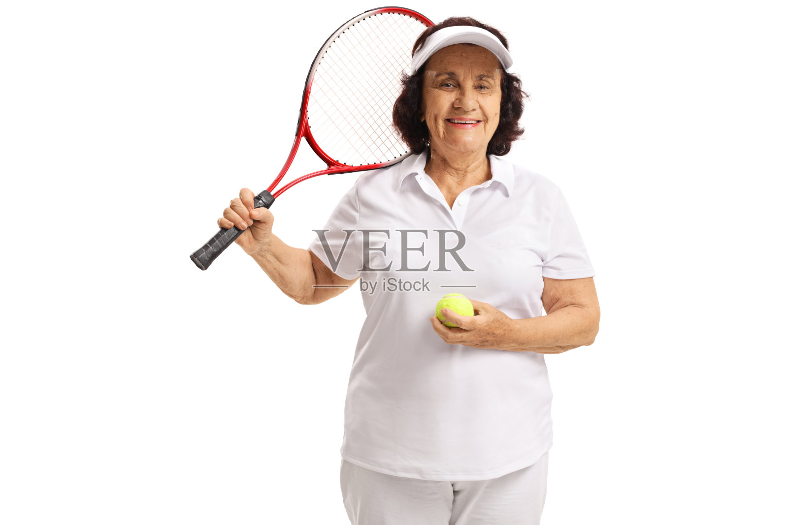 拿着网球拍和网球的老妇人照片摄影图片