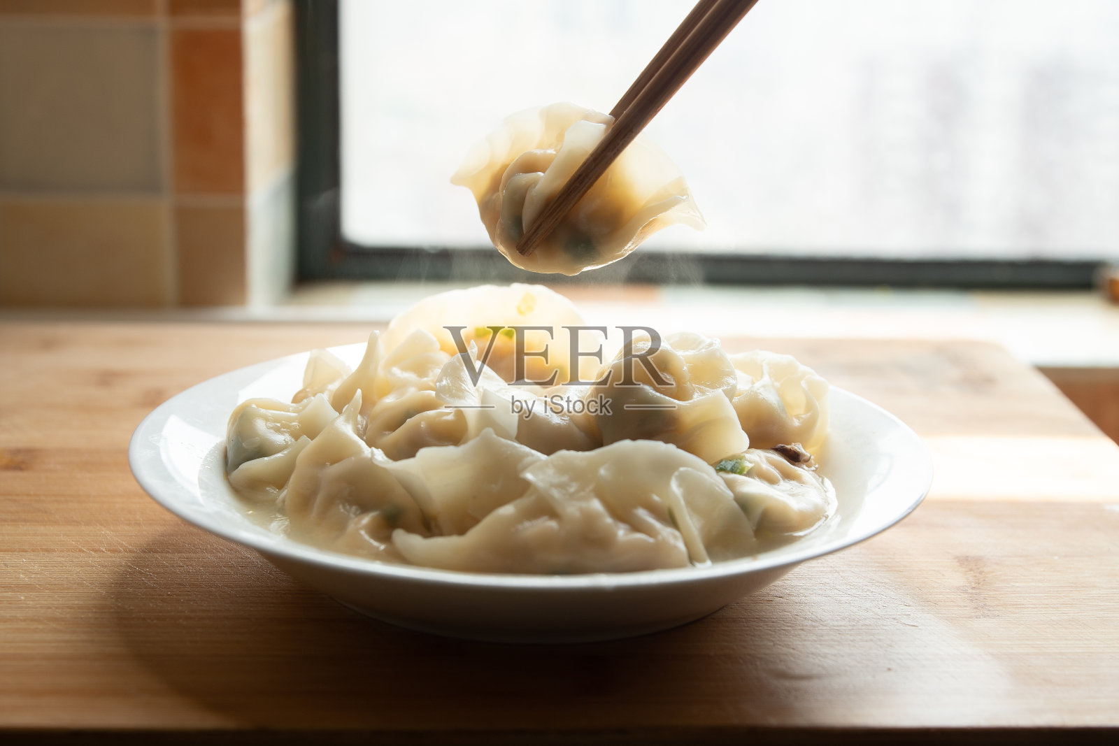 吃中国食物饺子照片摄影图片