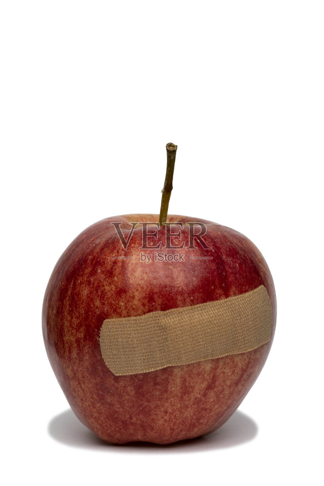 带绷带的红苹果照片摄影图片