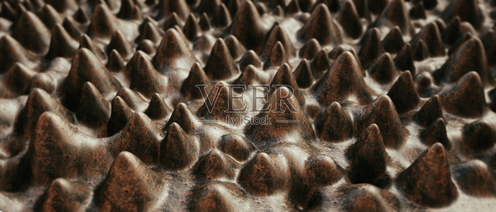 微距摄影特写的人工锥体形状的结构与粗糙的棕色生锈的表面照片摄影图片