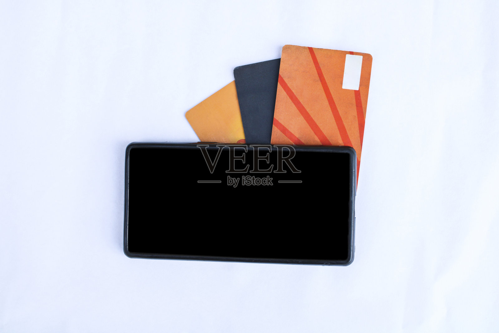 手机白色背景的信用卡/借记卡照片摄影图片