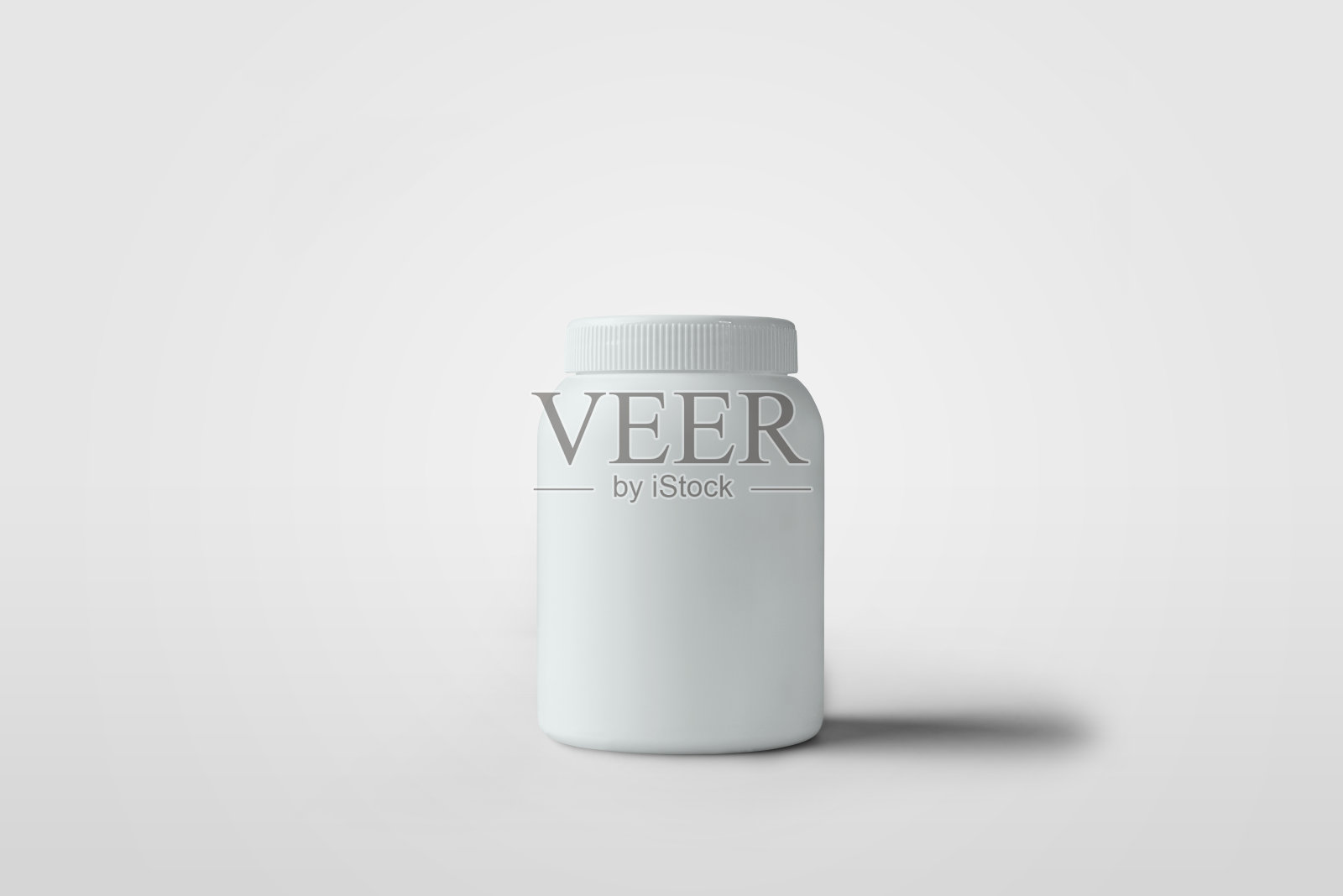 一个小罐的模型与一个健康的有机产品或维生素的盖子，一个瓶子在药店或药品的广告。照片摄影图片