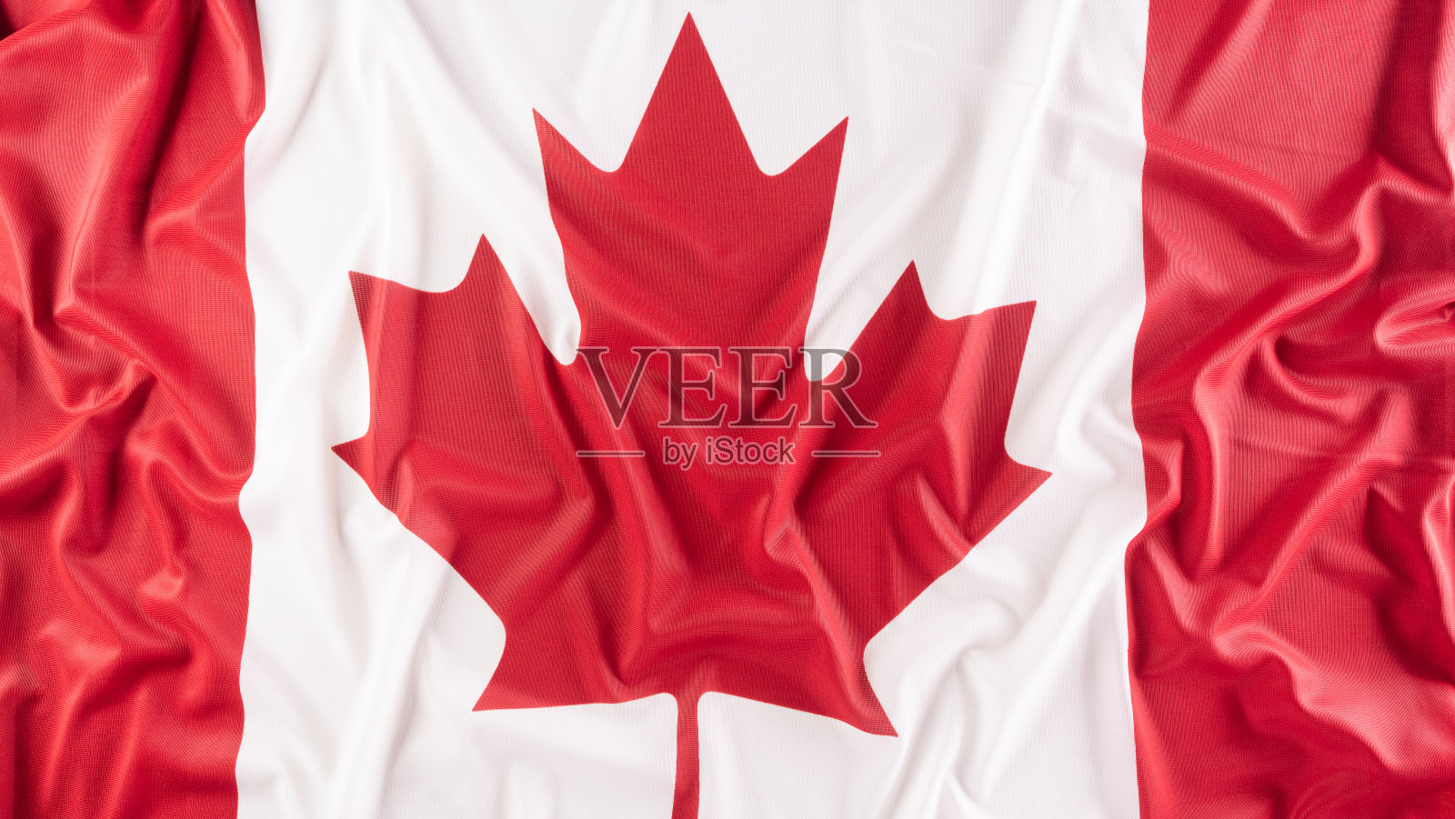美丽的加拿大国旗布料，标志或象征加拿大日的概念。照片摄影图片