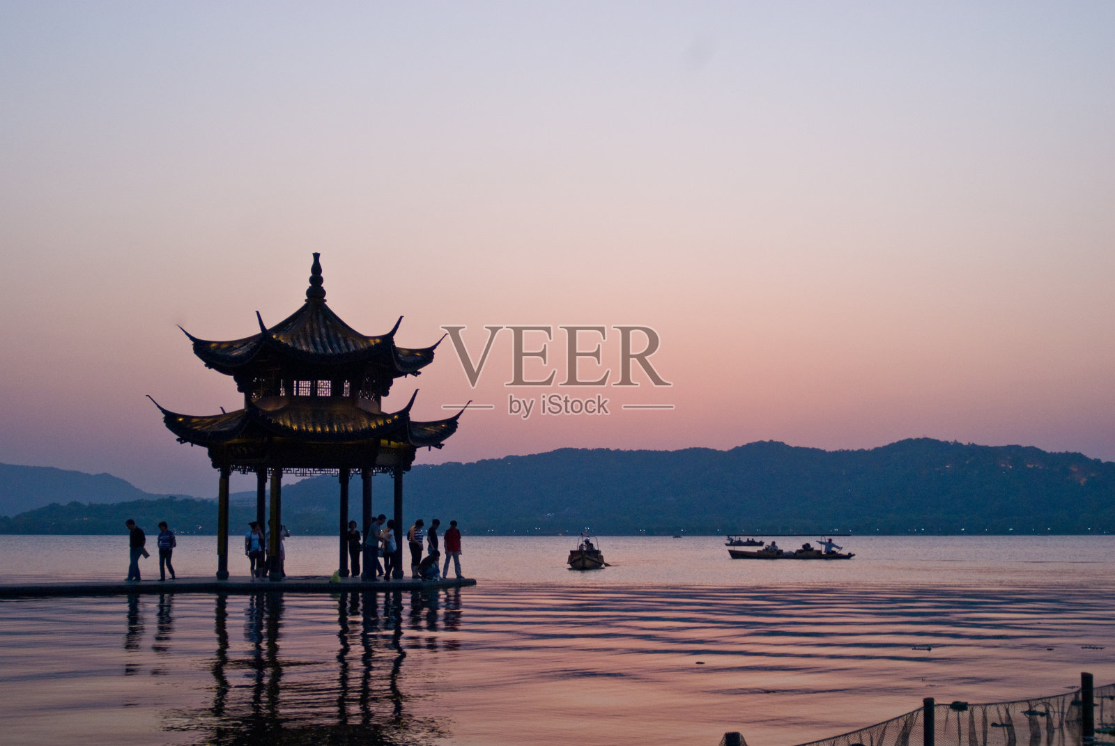 杭州西湖日落照片摄影图片