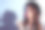 半转身近剪肖像的性优雅冷静和平沉思的黑发女士与葱郁卷曲的波浪发型吹出烟从嘴里孤立的灰色背景复制空间素材图片